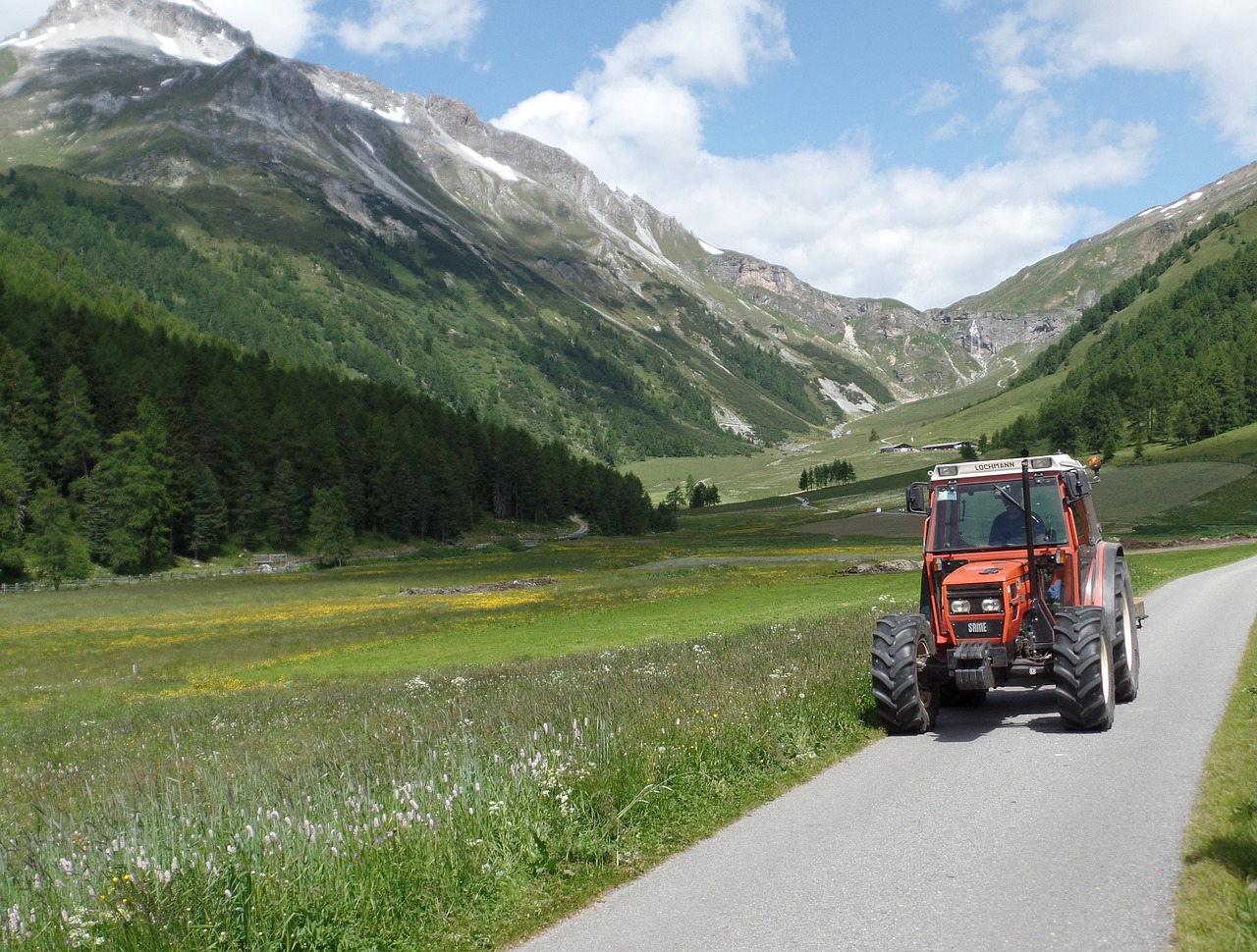 alpine mountains tractor free photo