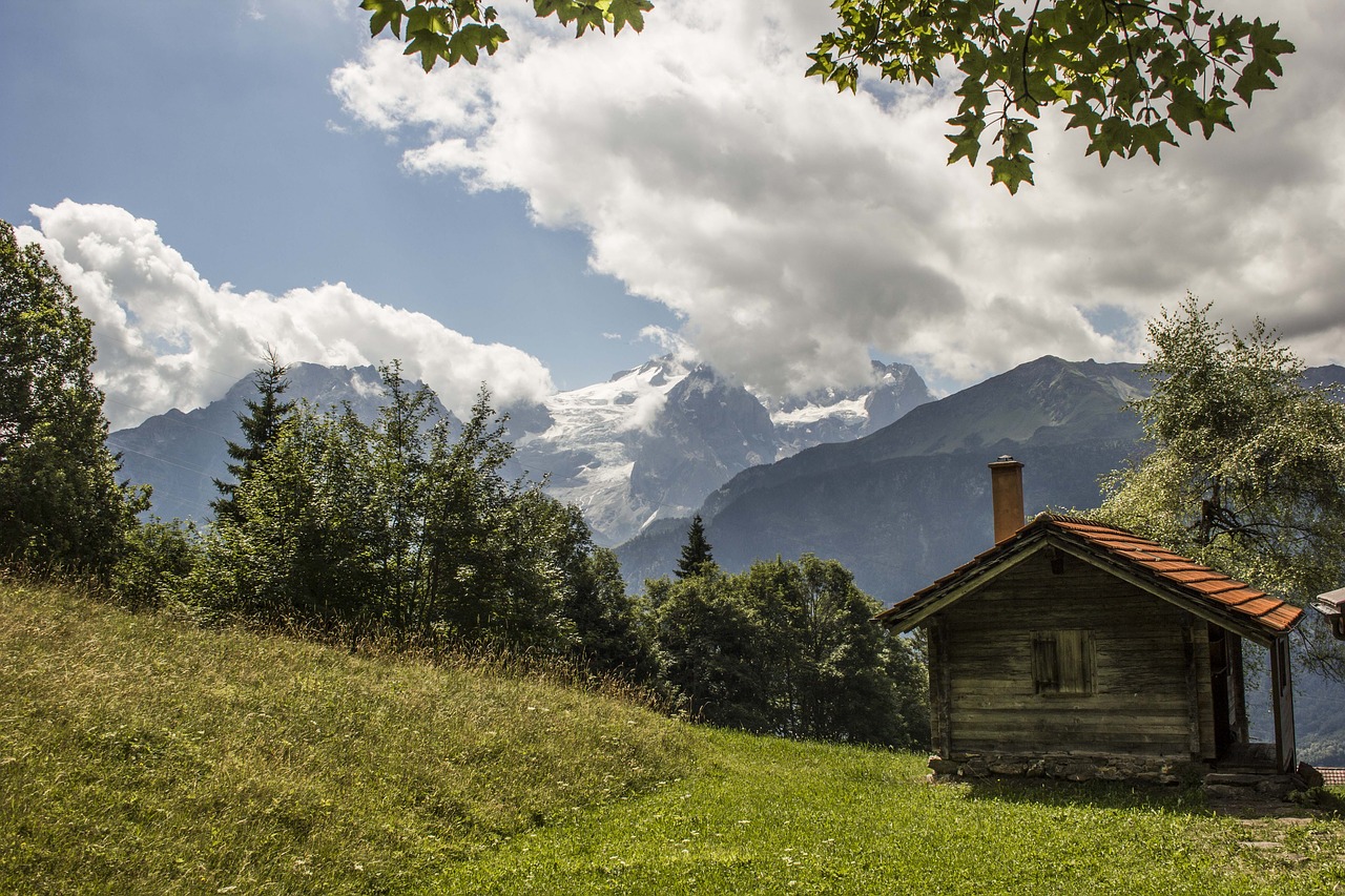 alpine hut mountains sky free photo