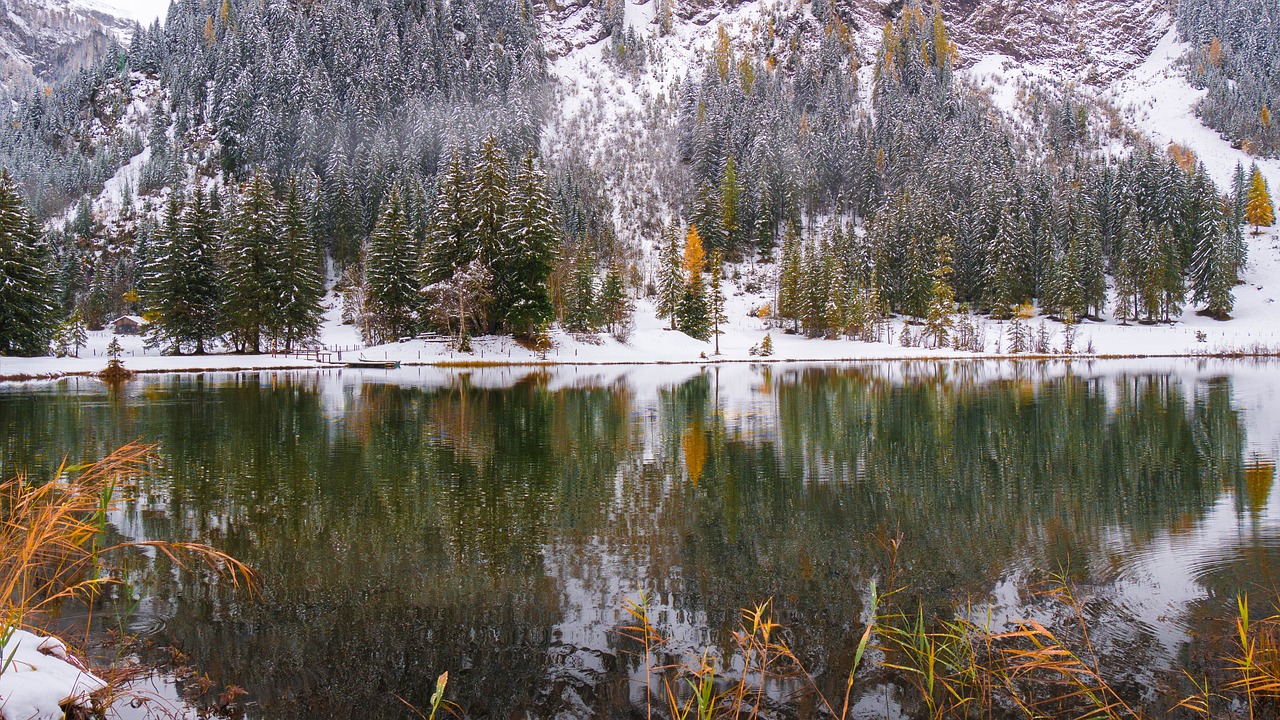 alpine lake snow mirroring free photo