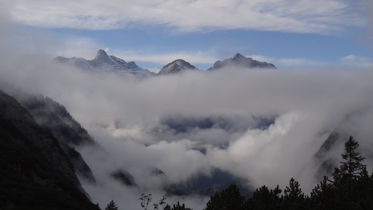 alps mountains clouds free photo