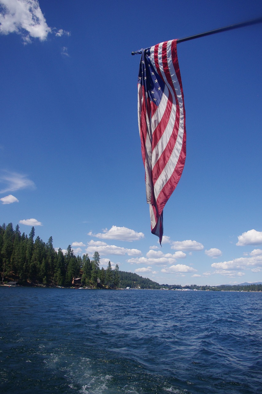 american flag boating water free photo