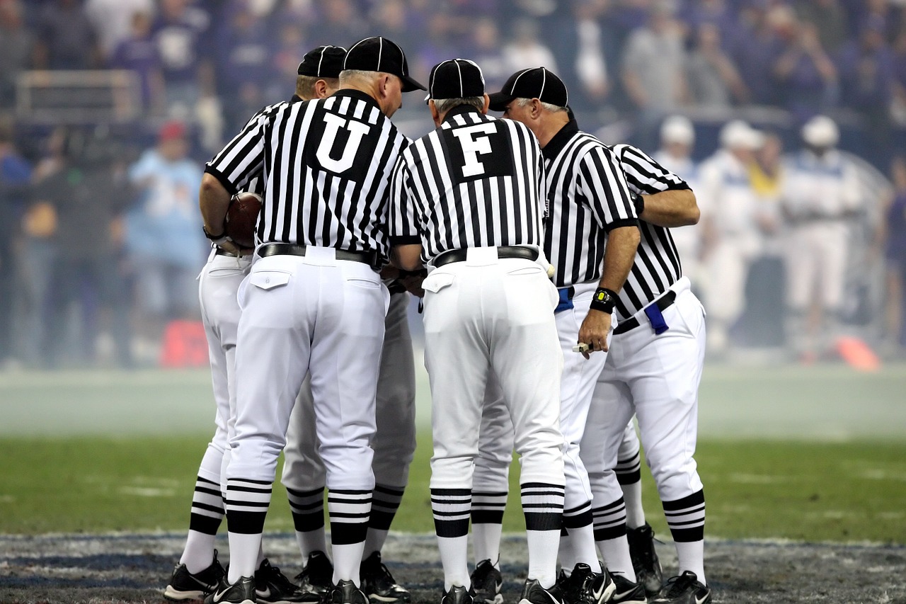 american football american football officials referees free photo