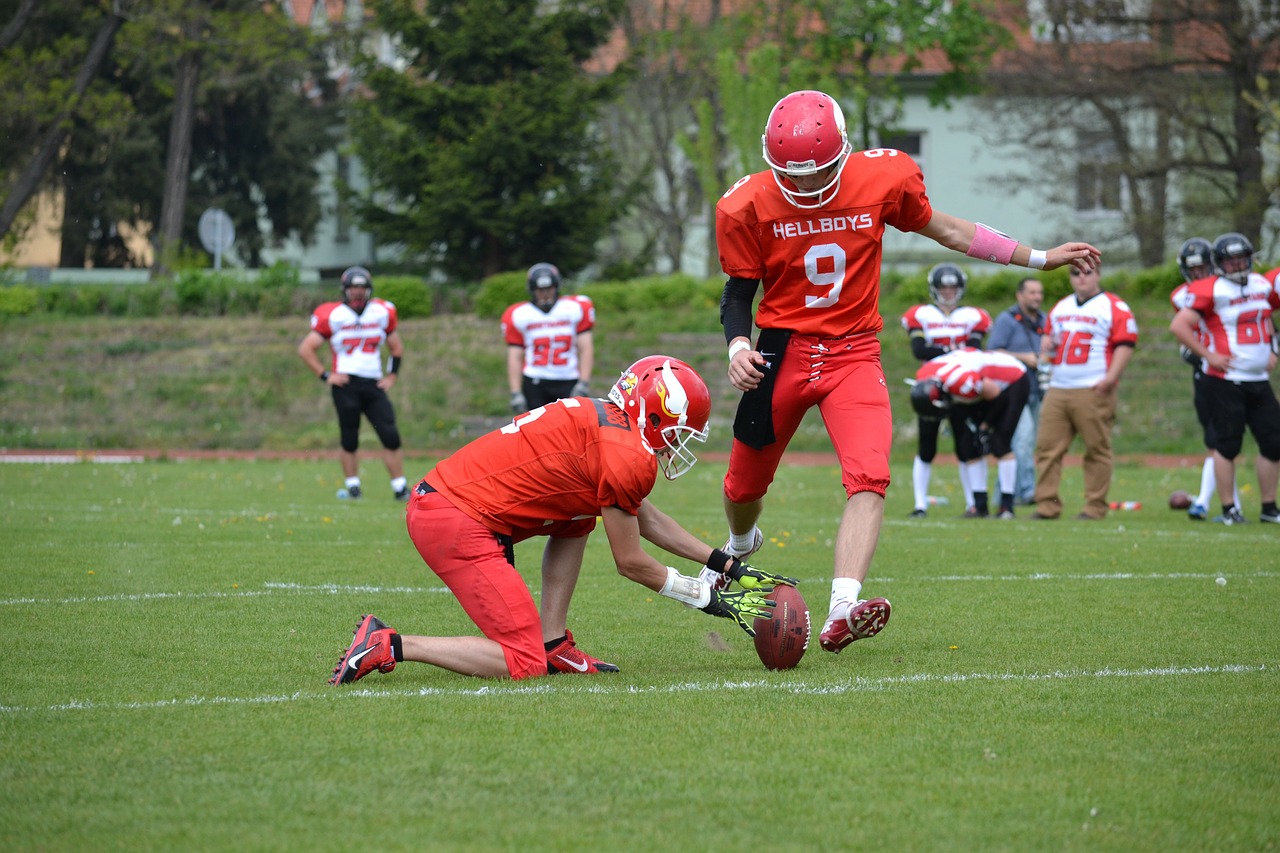 american football clearance holding free photo