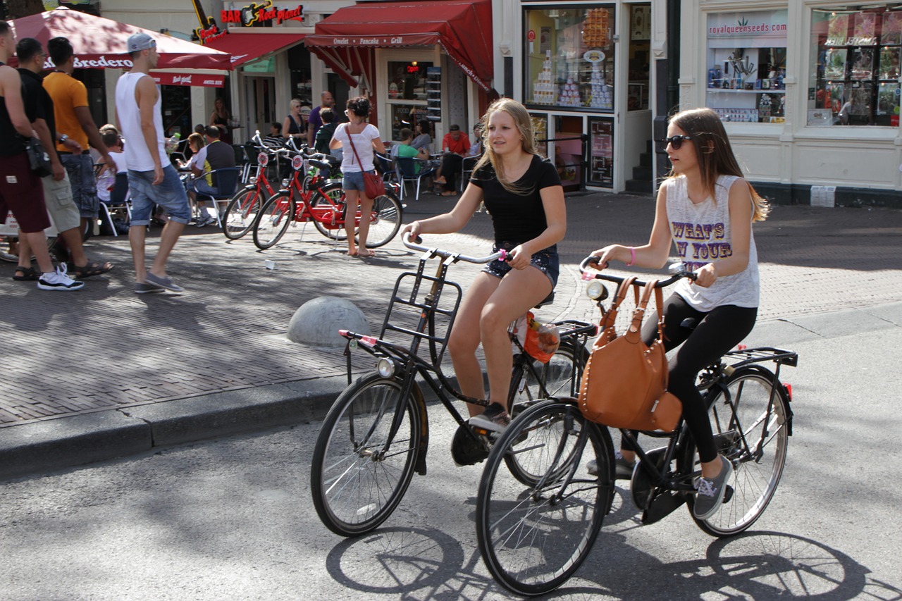 amsterdam bikes people free photo