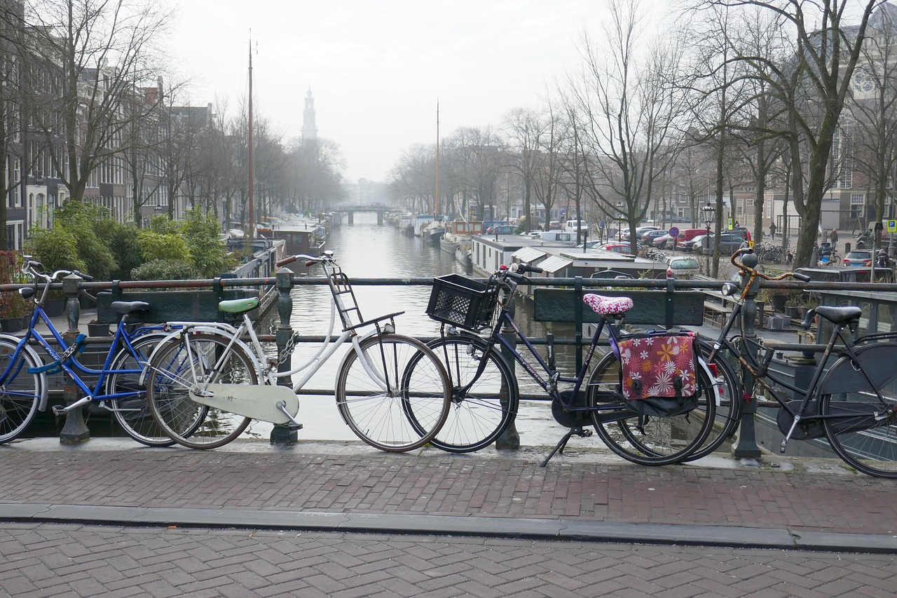 amsterdam  cycling  canal free photo