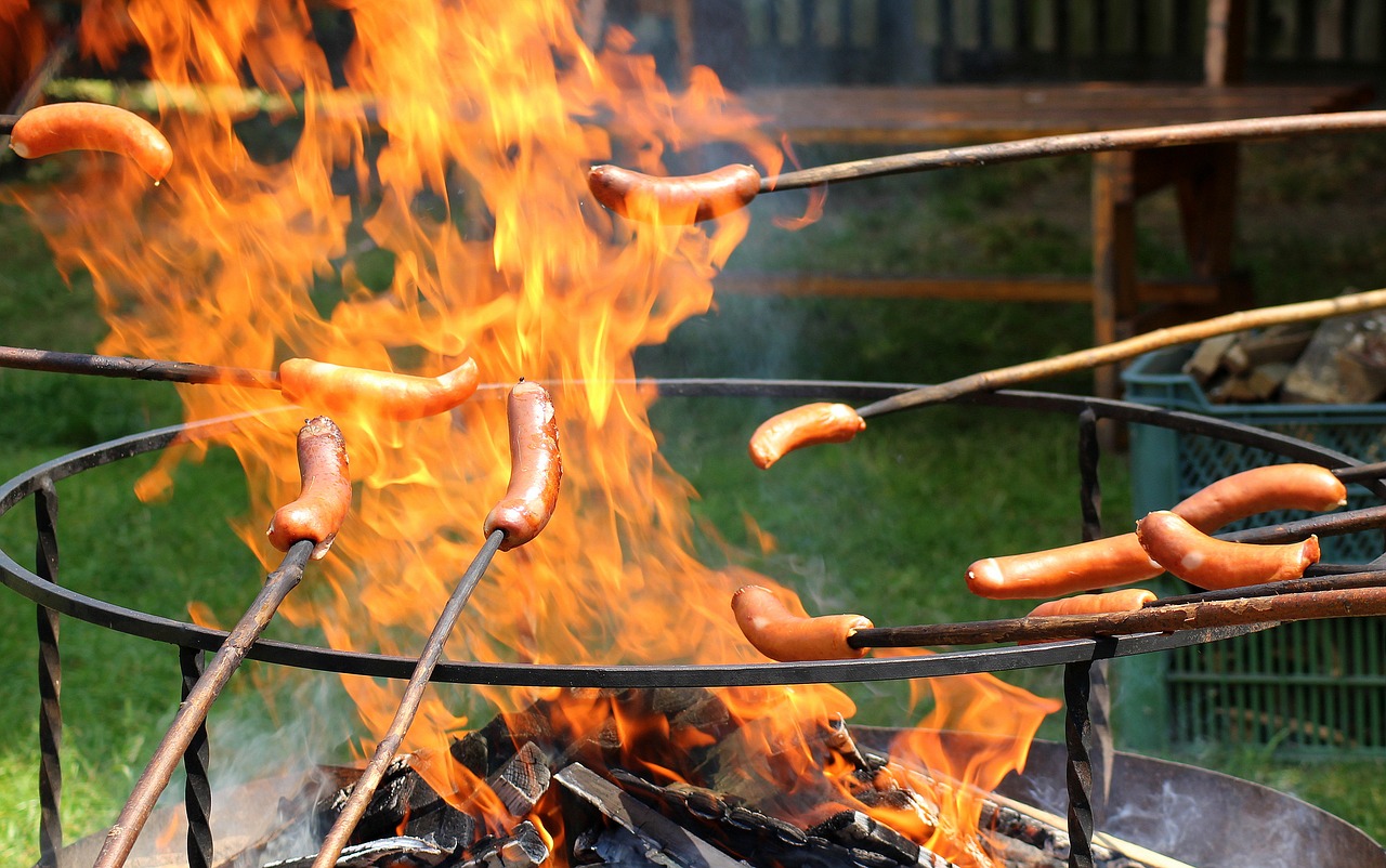 an outbreak of  sausages  burning free photo