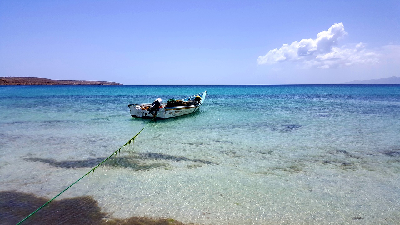 anchored boat coast free photo