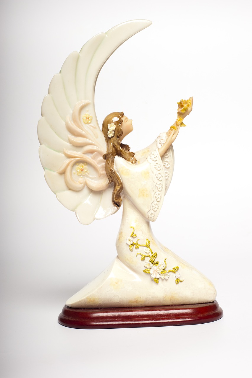 angel statuette statue of an angel free photo