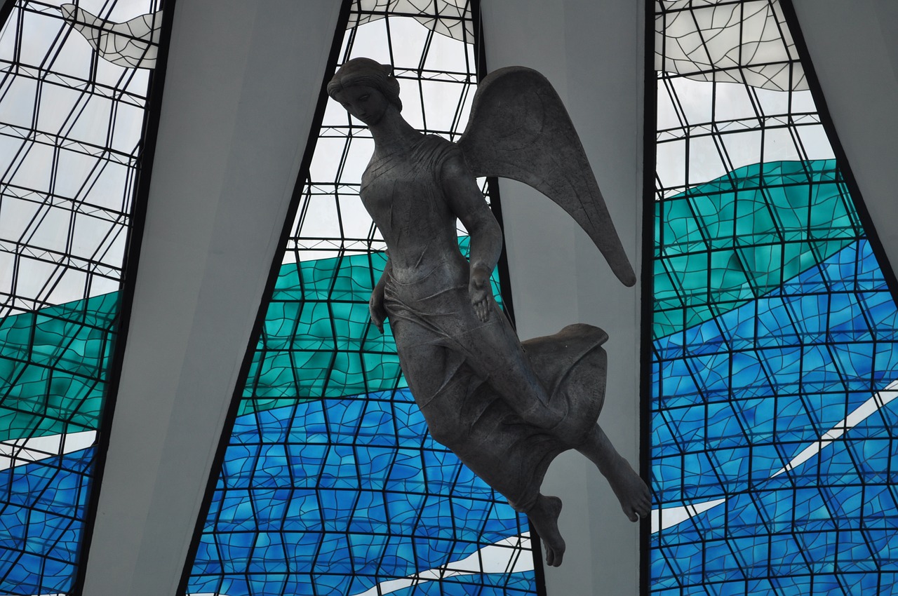 angel sculpture stained glass free photo