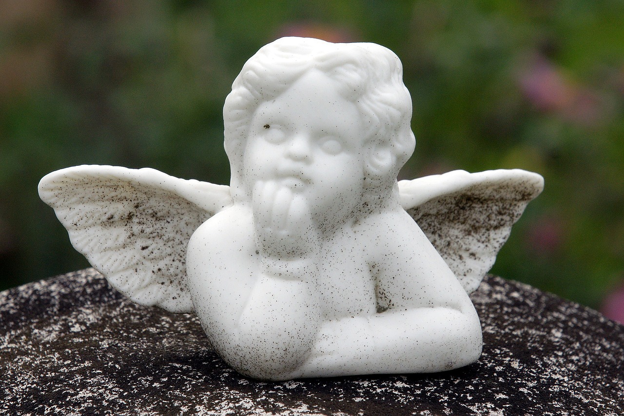 angel angel figure reclining angel free photo