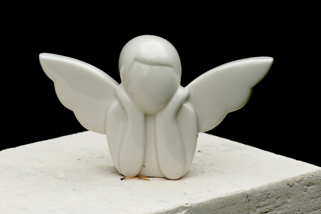 angel contemplative figure free photo