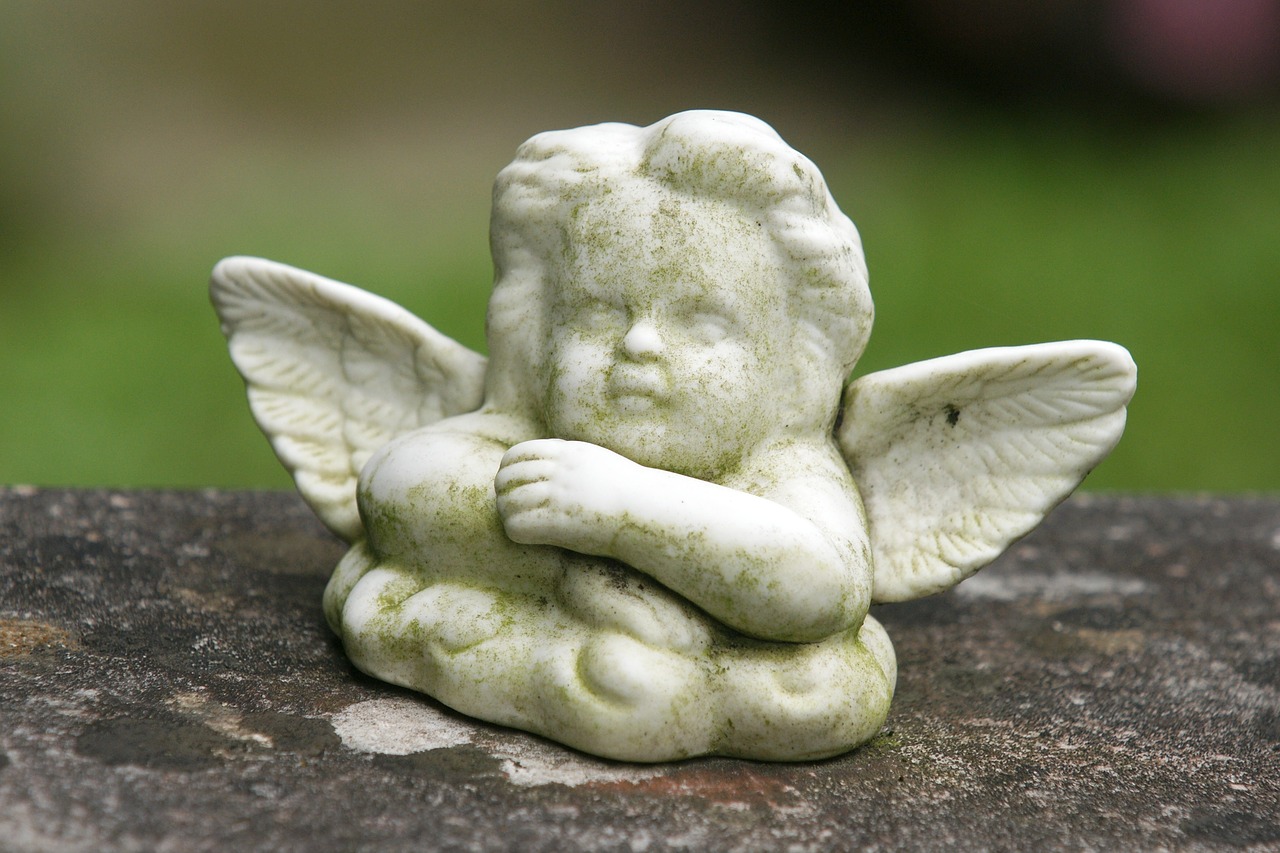 angel contemplative figure free photo