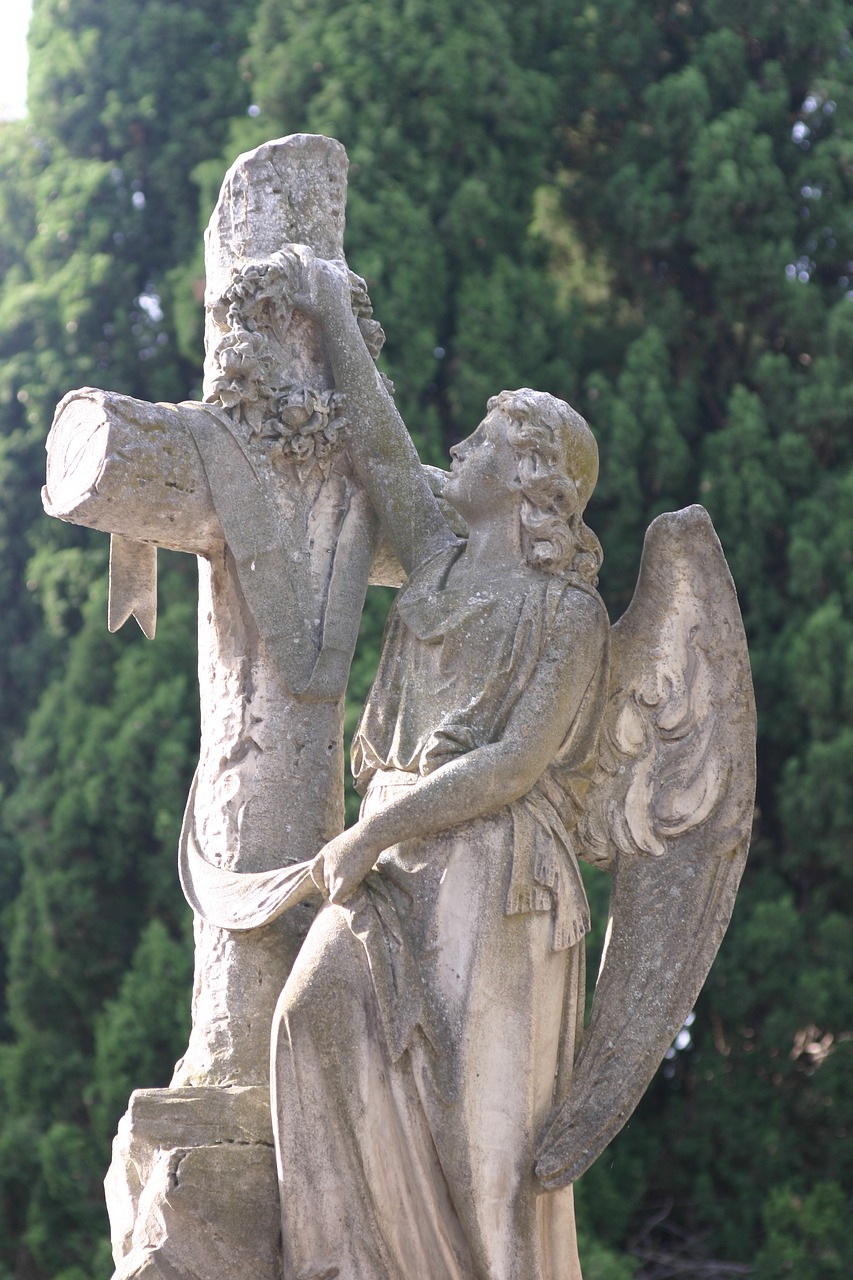 angel with cross  cemetery  carmen free photo