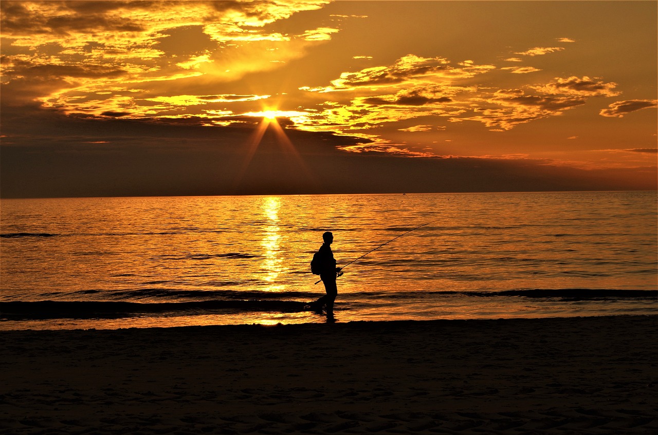 angler sea sunset free photo