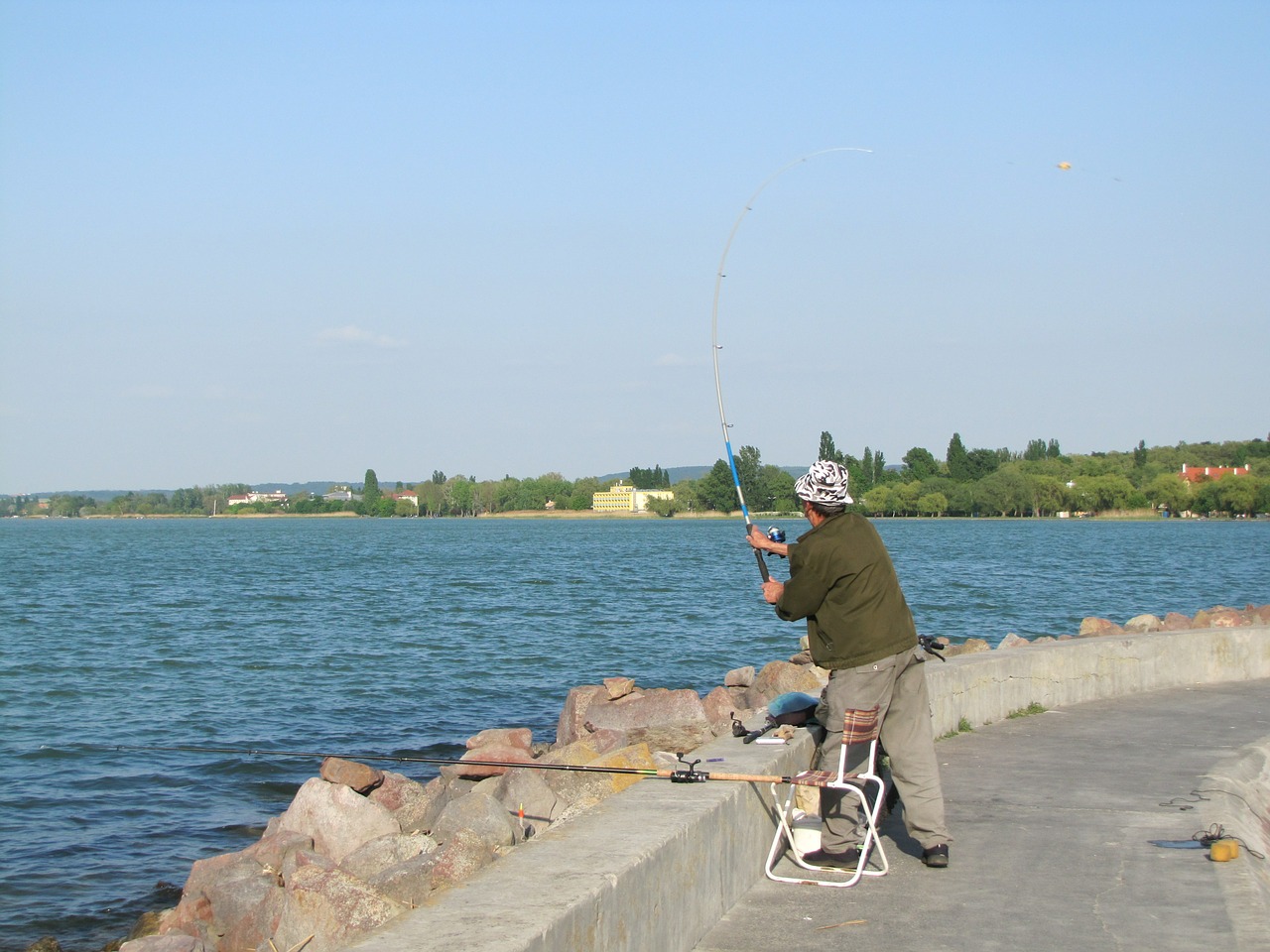 angler fishing rods water free photo