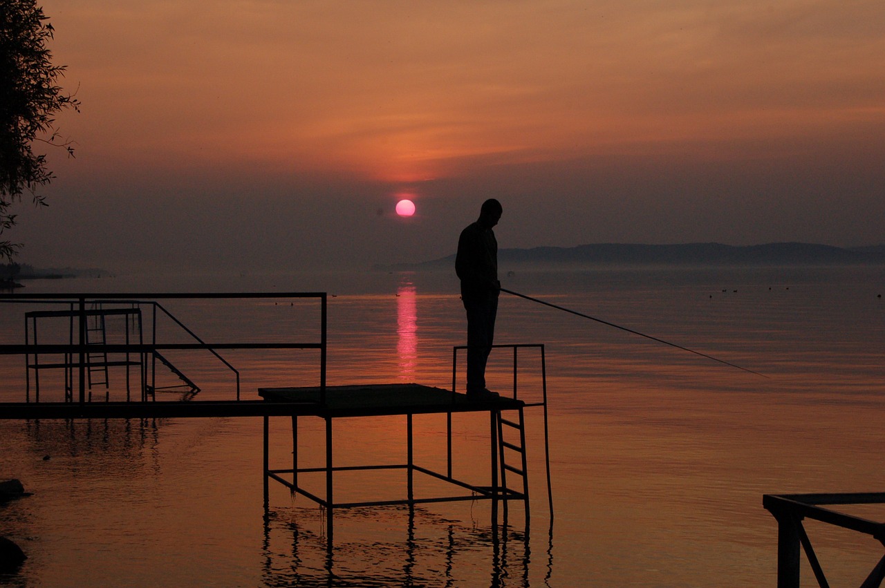 angler sunset lake balaton free photo