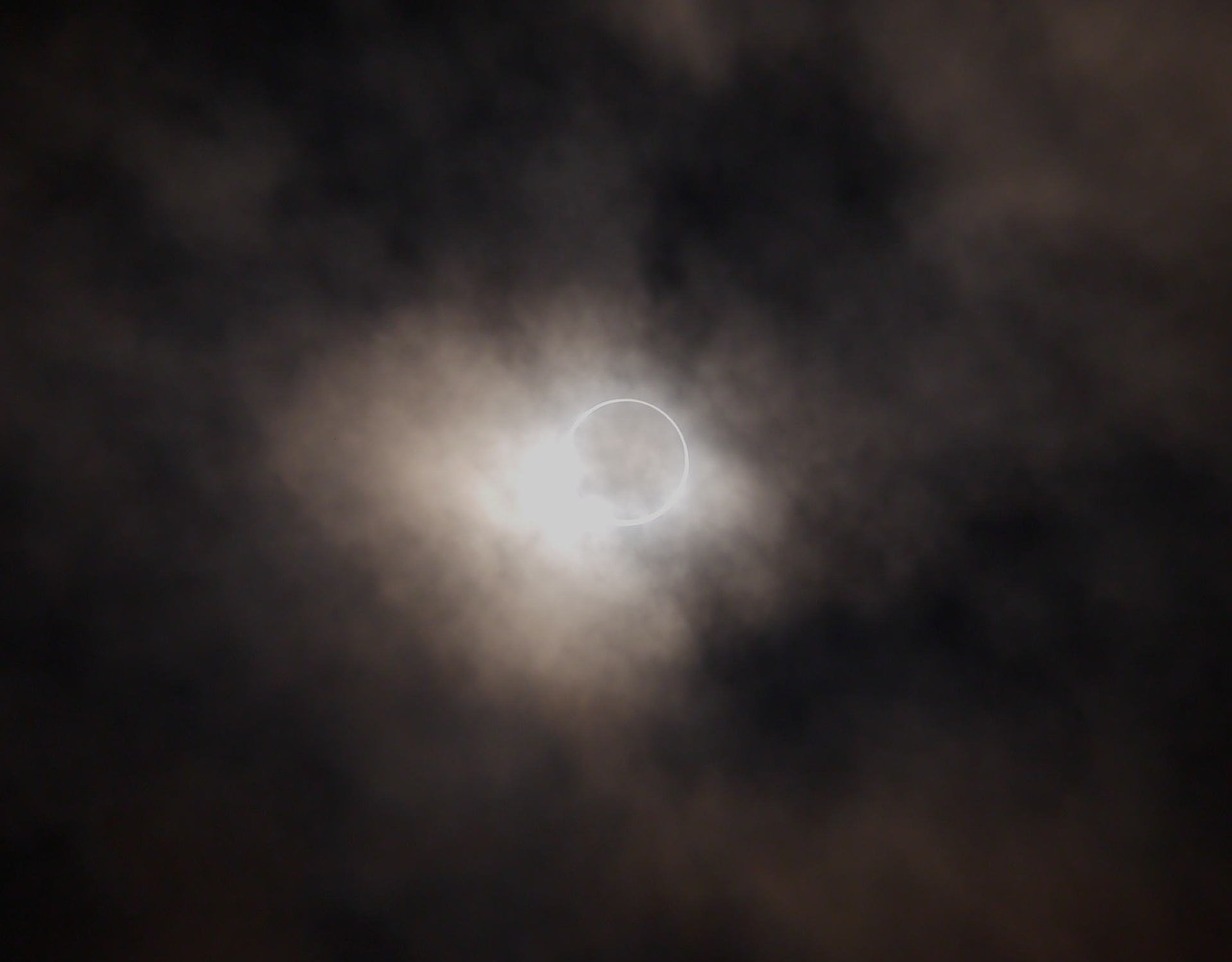 annular eclipse eclipse cloudy sky free photo