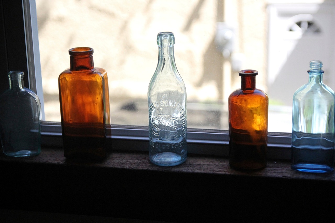 antique glass bottles free photo