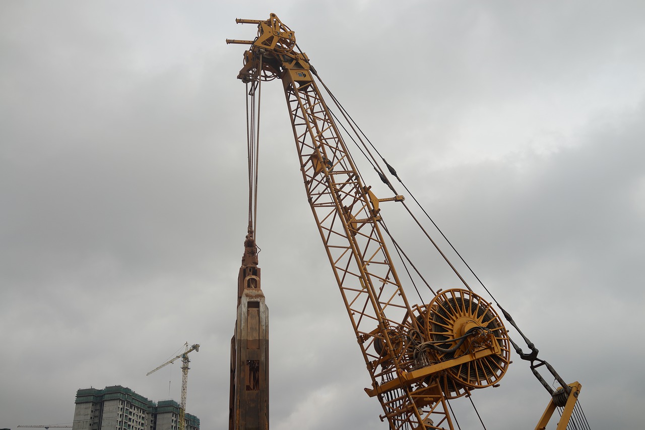 asian construction site  heavy machinery  super lifting power free photo