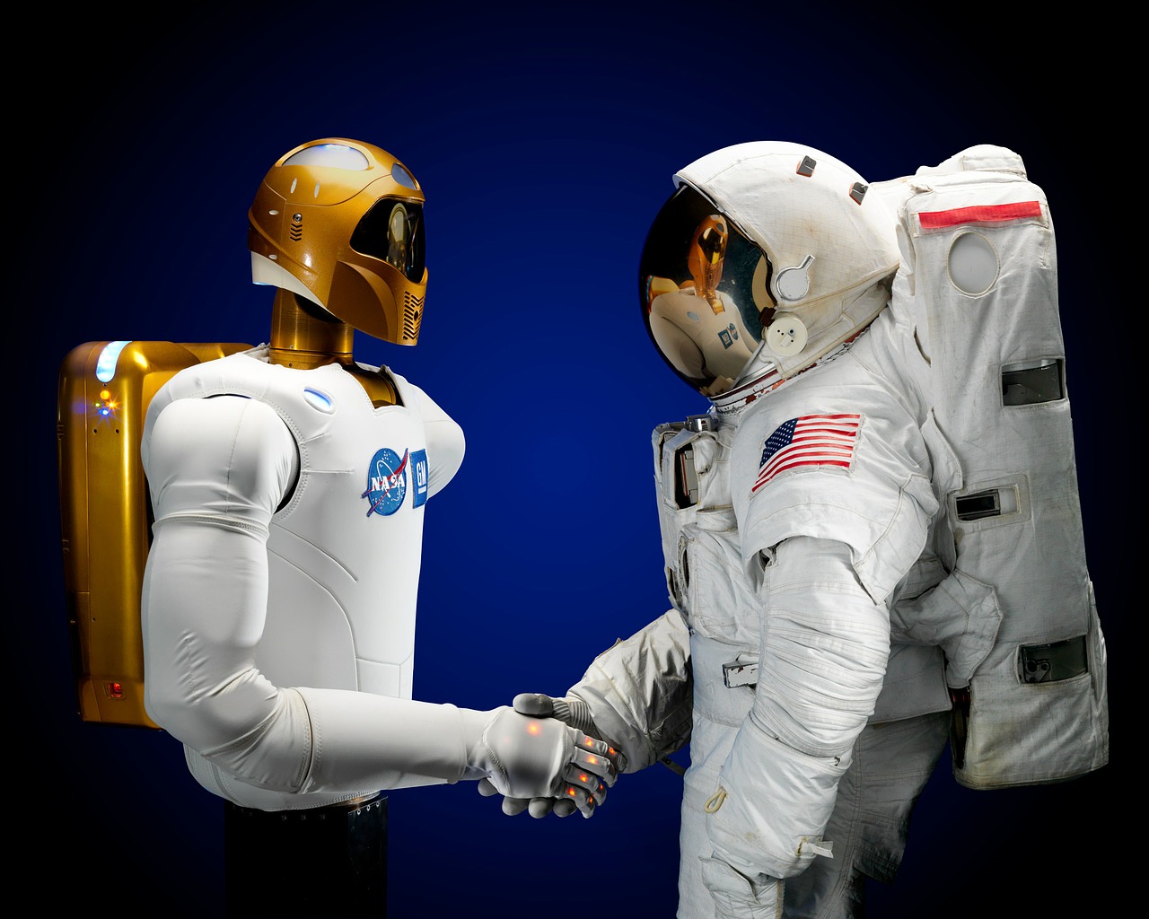 astronaut robonaut handshake free photo