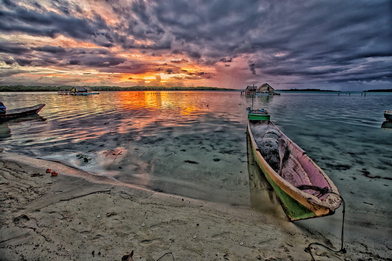 at dusk lagoon dugout canoe free photo