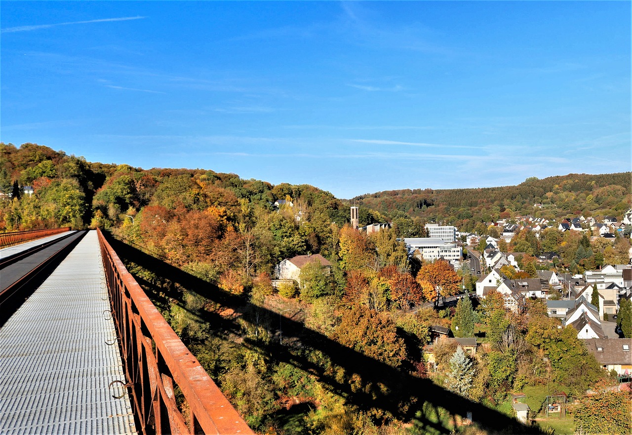 at the top of the railway bridge  westerburg  railing free photo
