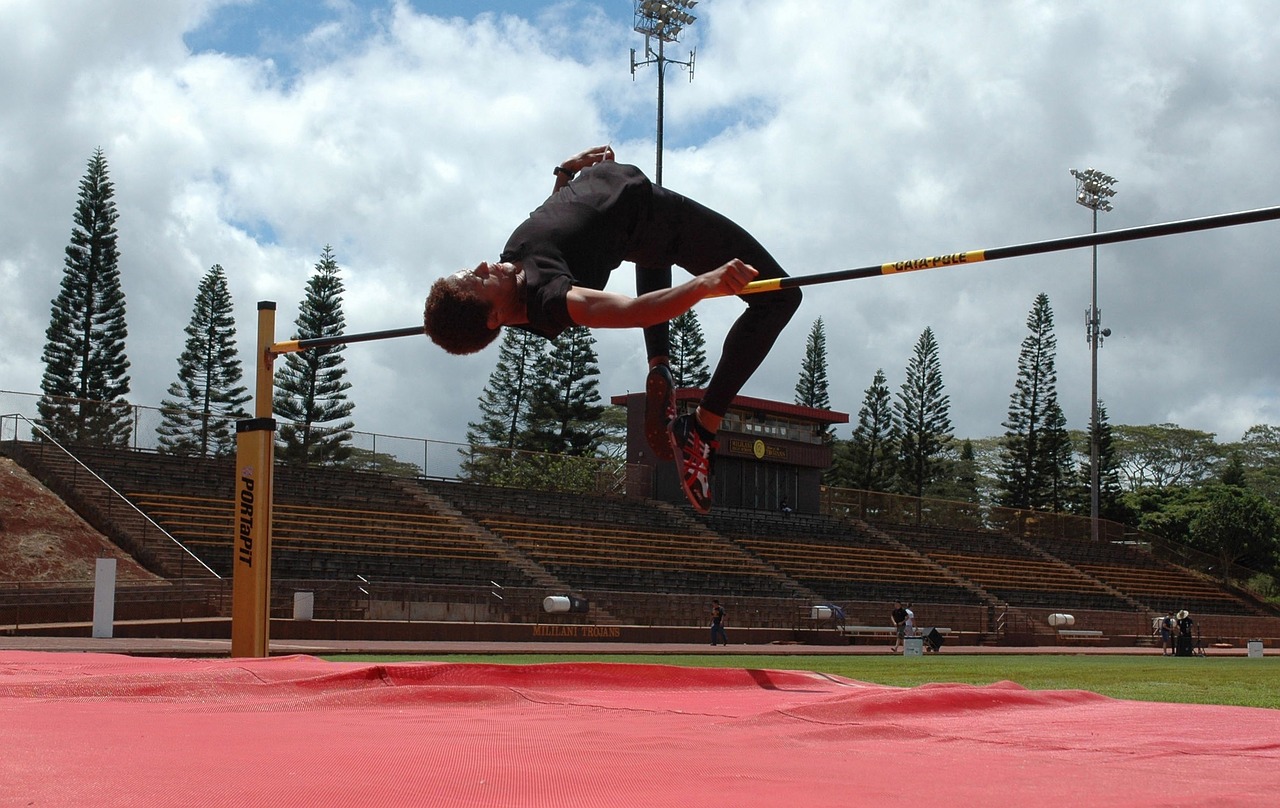 athlete high jump crossbar free photo