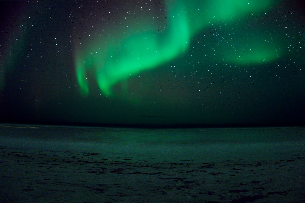 aurora borealis  beach  stars free photo