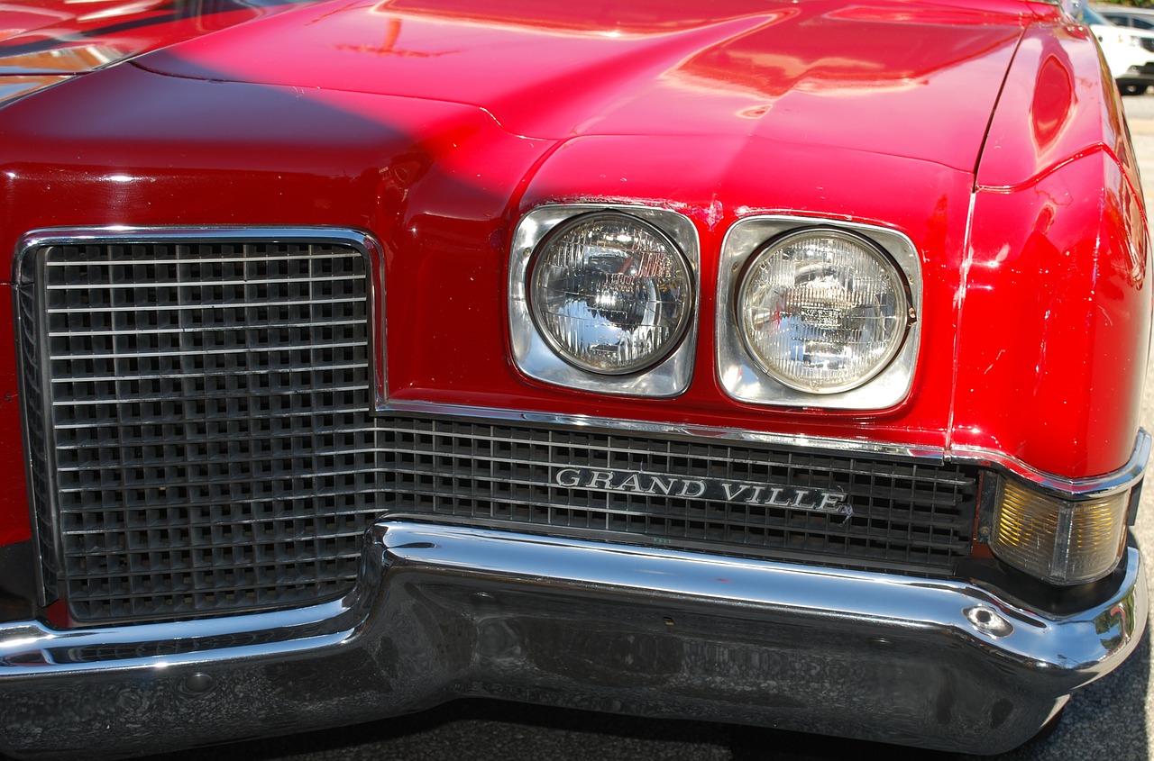 automobile grand ville red free photo