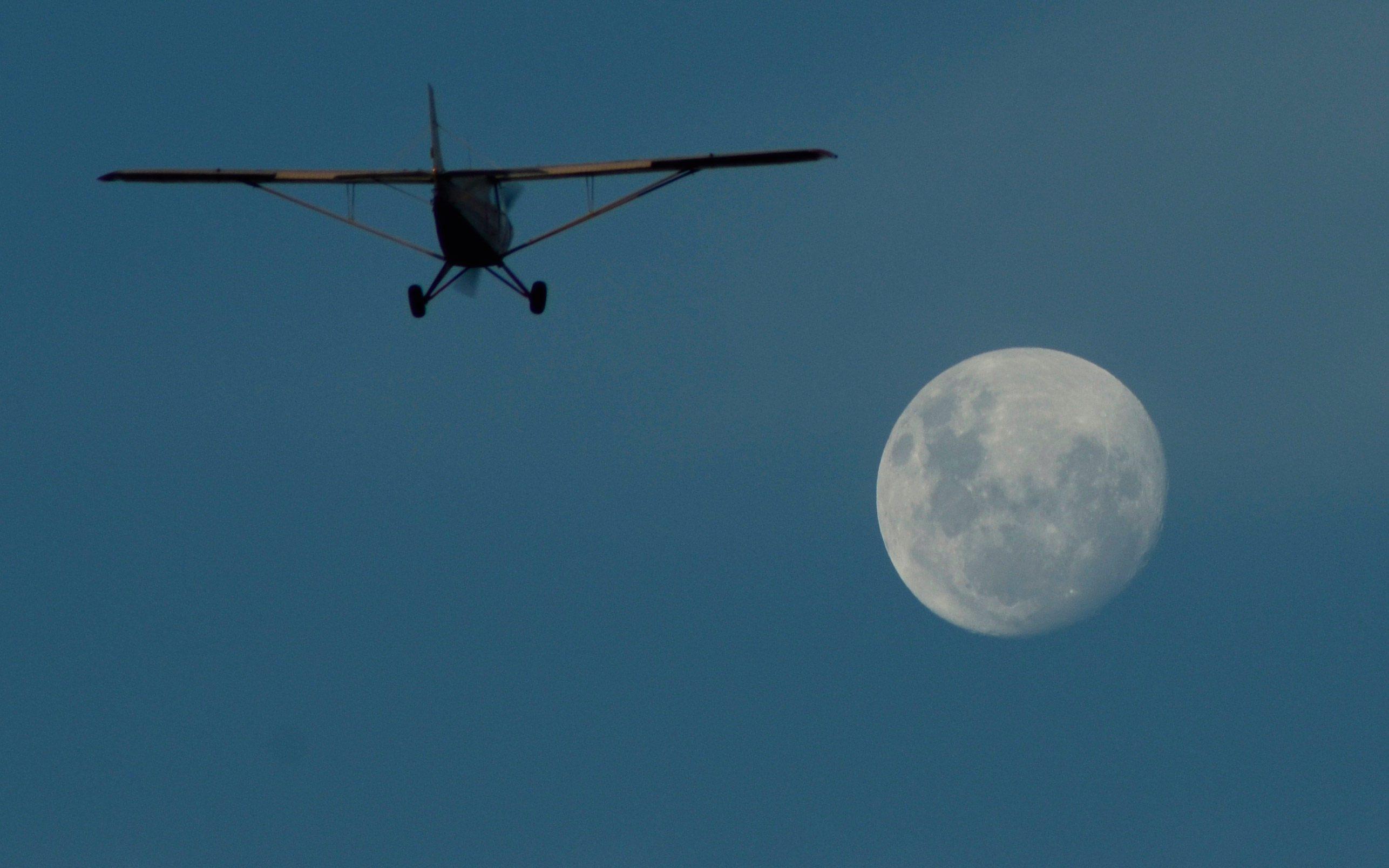 airplane moon airplane and moon free photo