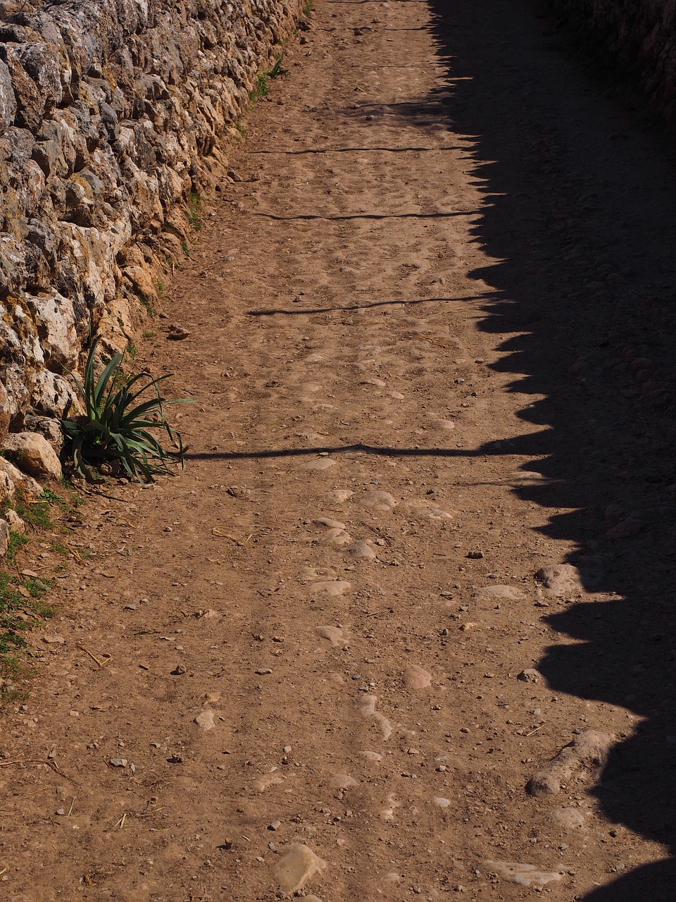 away lane stone wall free photo