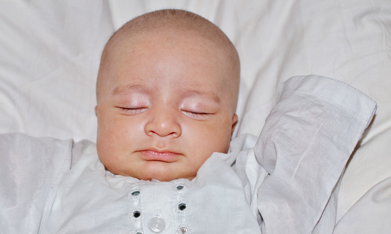Newborn Baby Sleep At First Days Of Life Portrait Of New Born