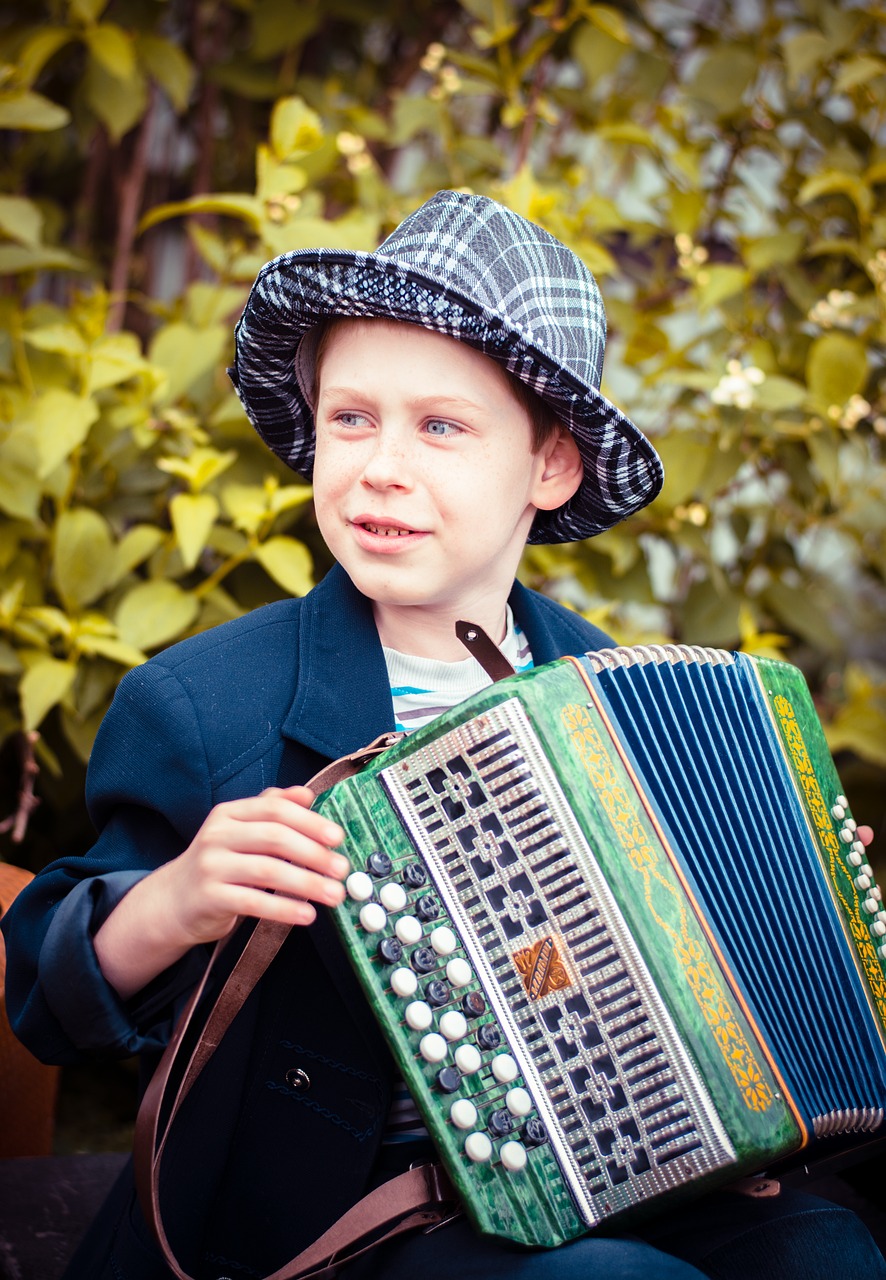 baby accordion player boy free photo