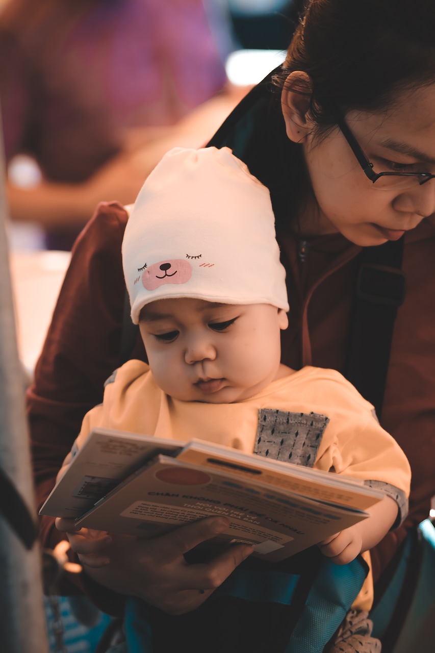 baby  reading  book free photo