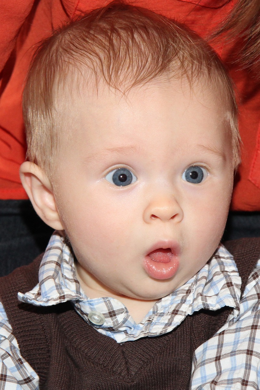 baby boy surprise expression free photo