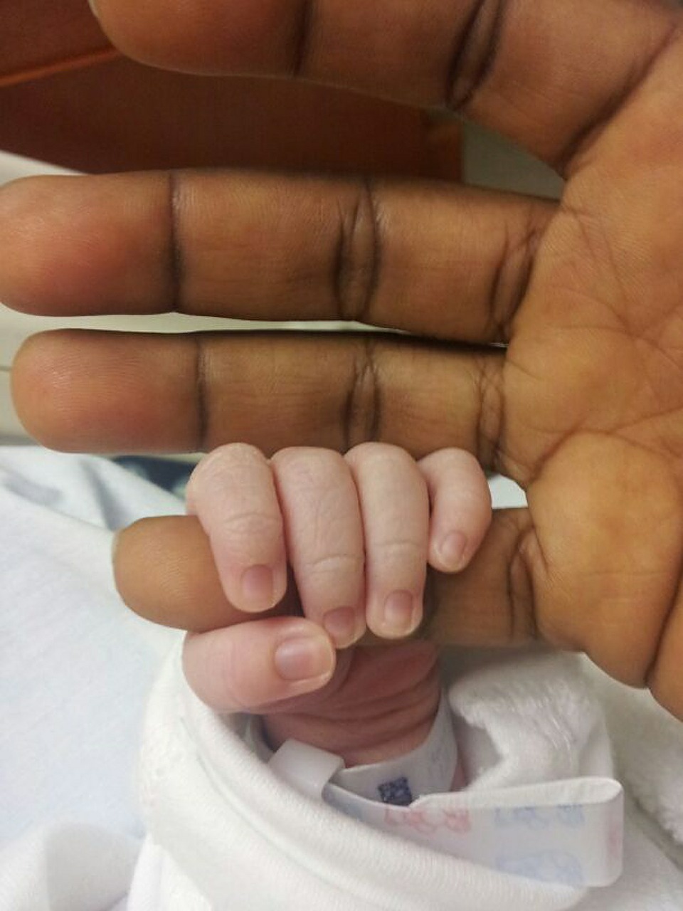 baby's hand reborn white brown free photo