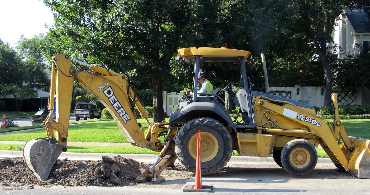 backhoe digging worker free photo