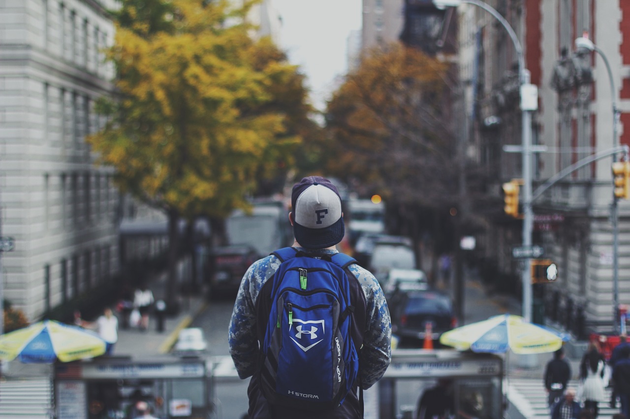 backpack male city street free photo
