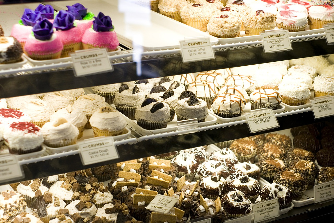 bake shop cupcakes display tasty treats free photo