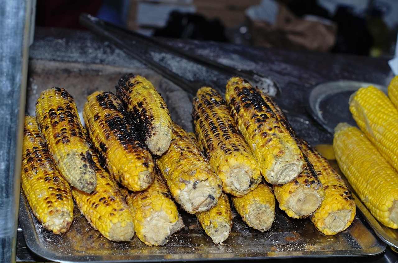 baked corn street food salted corn free photo