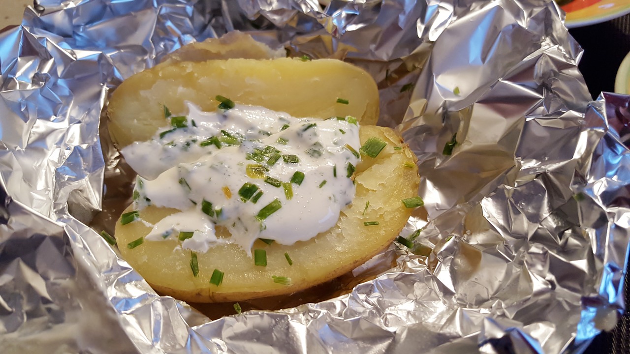 baked potatoes potato dish aluminum foil free photo