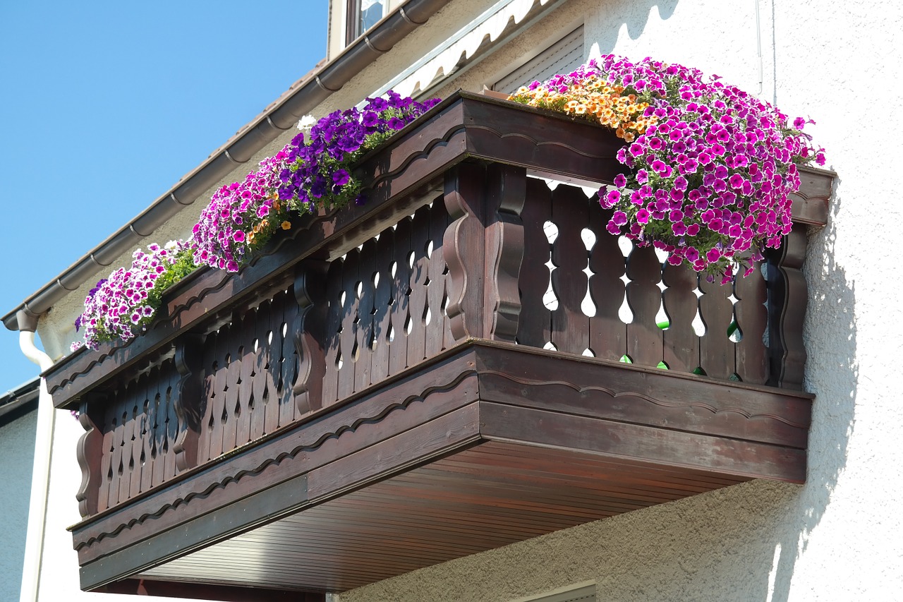 balcony decorated flowers free photo