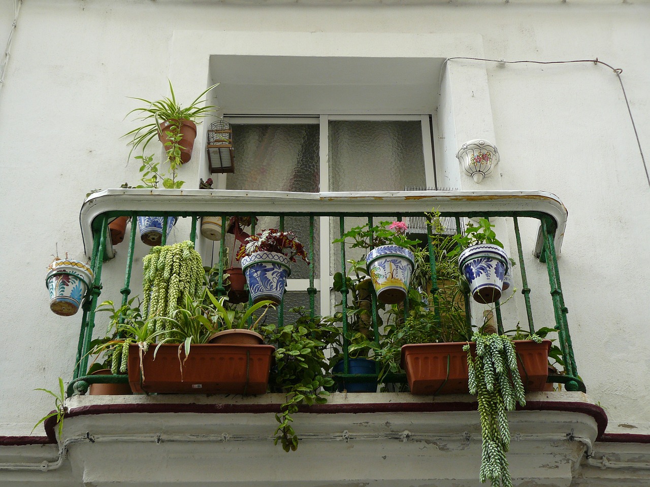 balcony exterior decoration hanging basket free photo