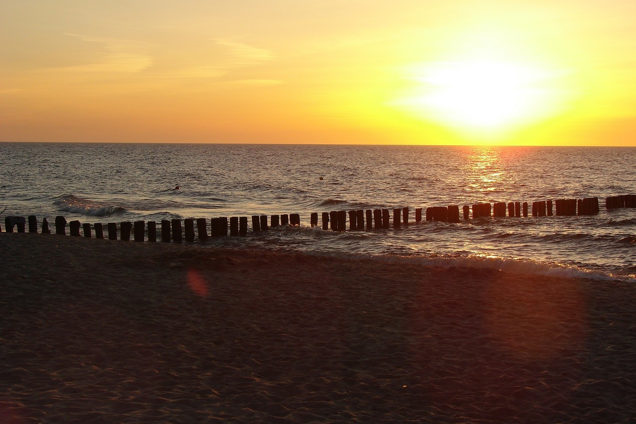 baltic sea breakwater sunset free photo