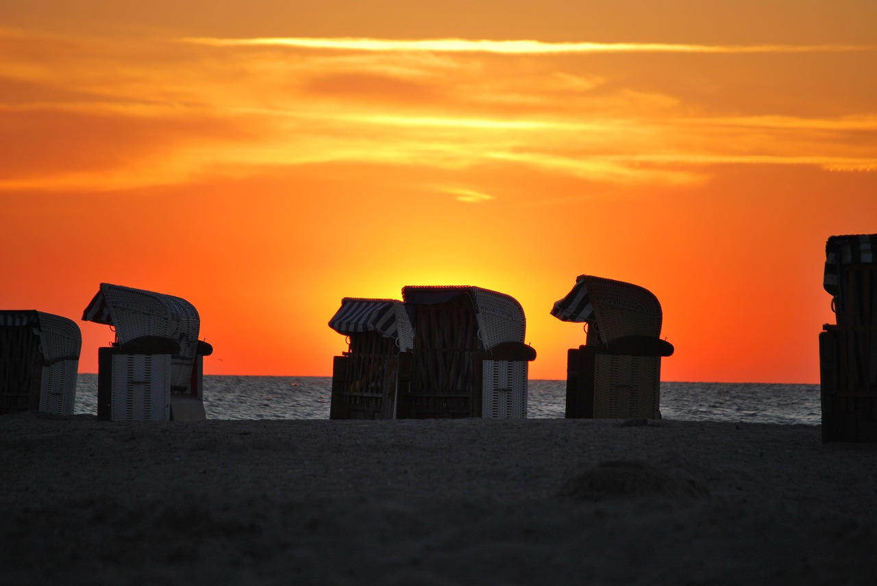 baltic sea sunset beach chair free photo
