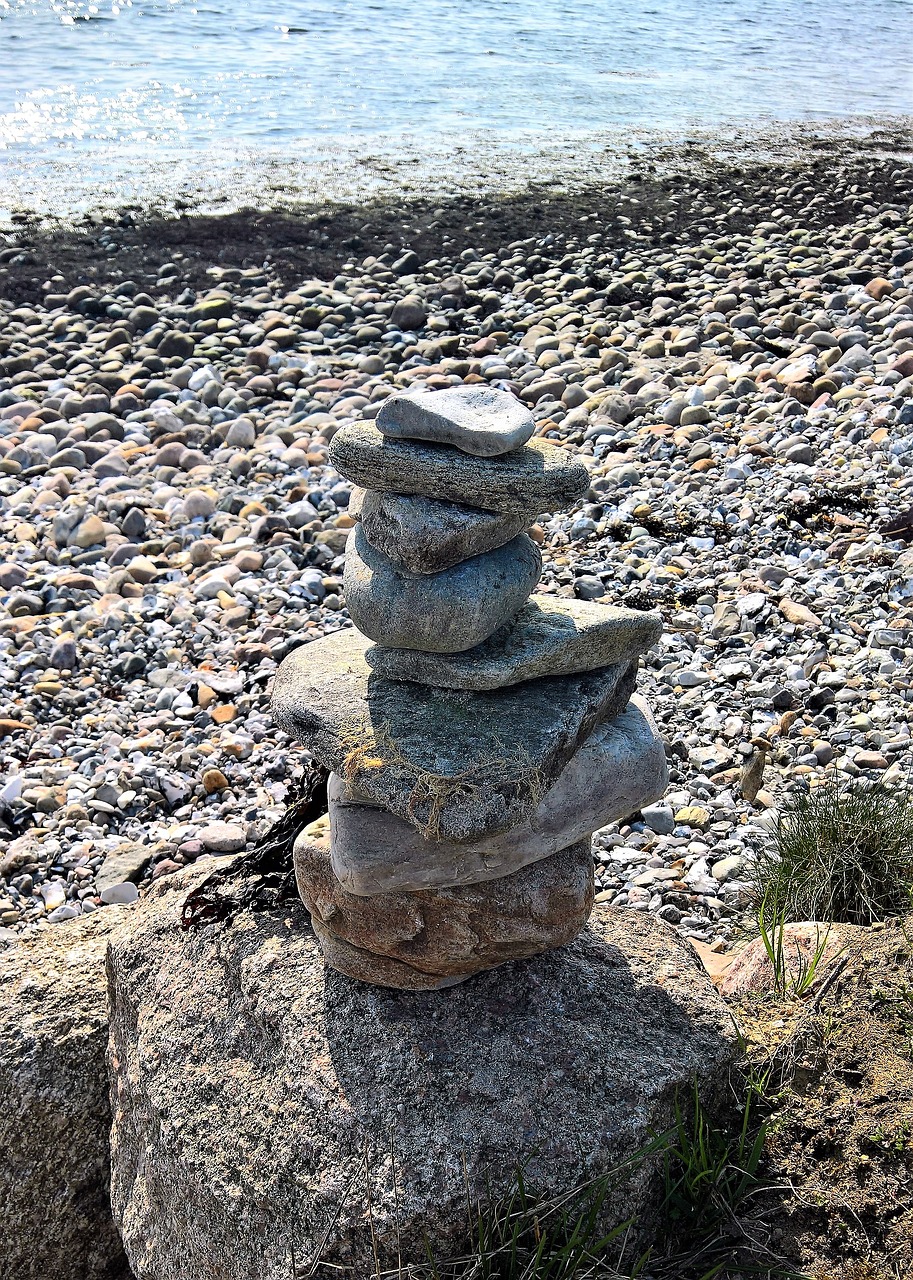 baltic sea beach  stone figure  successive laminated stones free photo