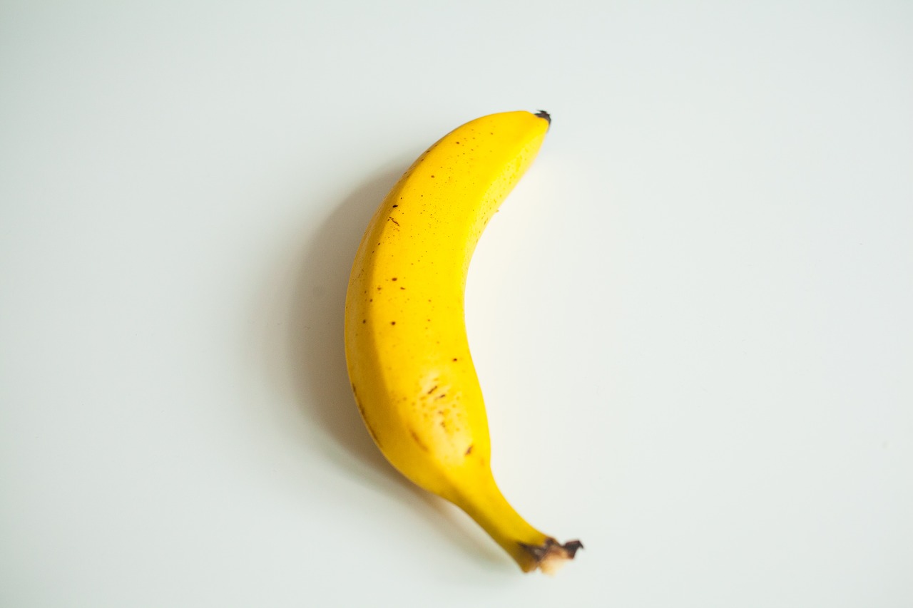 banana yellow white background free photo