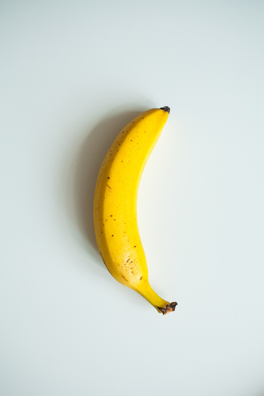 banana yellow white background free photo