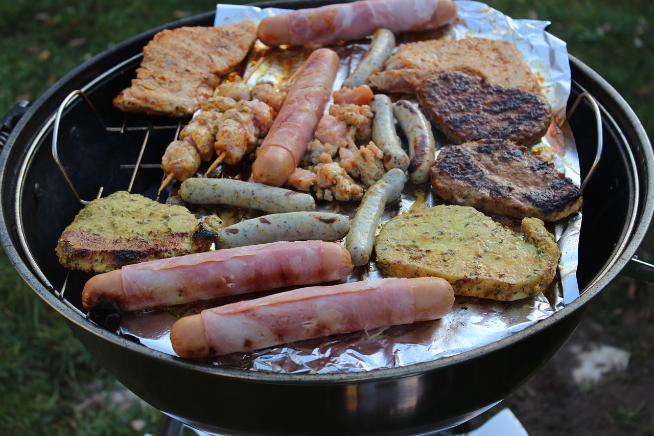 barbecue steaks sausages free photo
