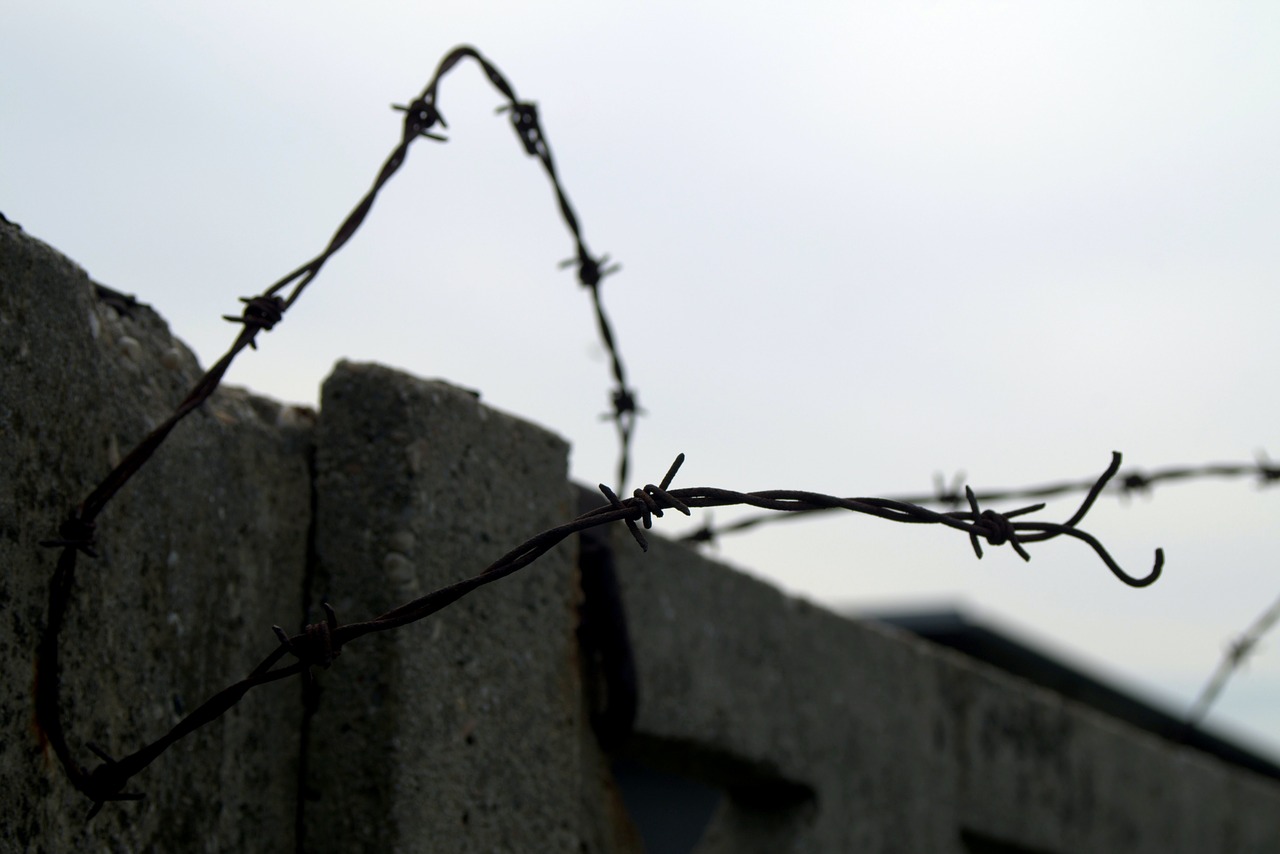 barbed wire the closure of prison free photo